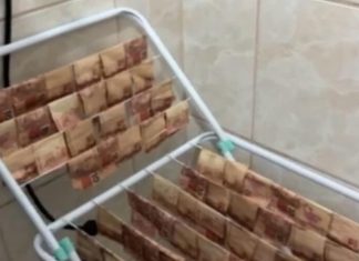 Em SC polícia encontra R$ 400 mil molhados secando em varal durante ação contra lavagem de dinheiro