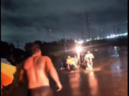 Policial de folga salva família de carro submerso durante alagamento