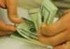 Dólar cai para R$ 4,95 e fecha no menor valor em dois anos