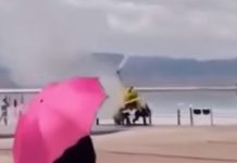 Helicóptero cai sobre banhistas durante voo turístico na China